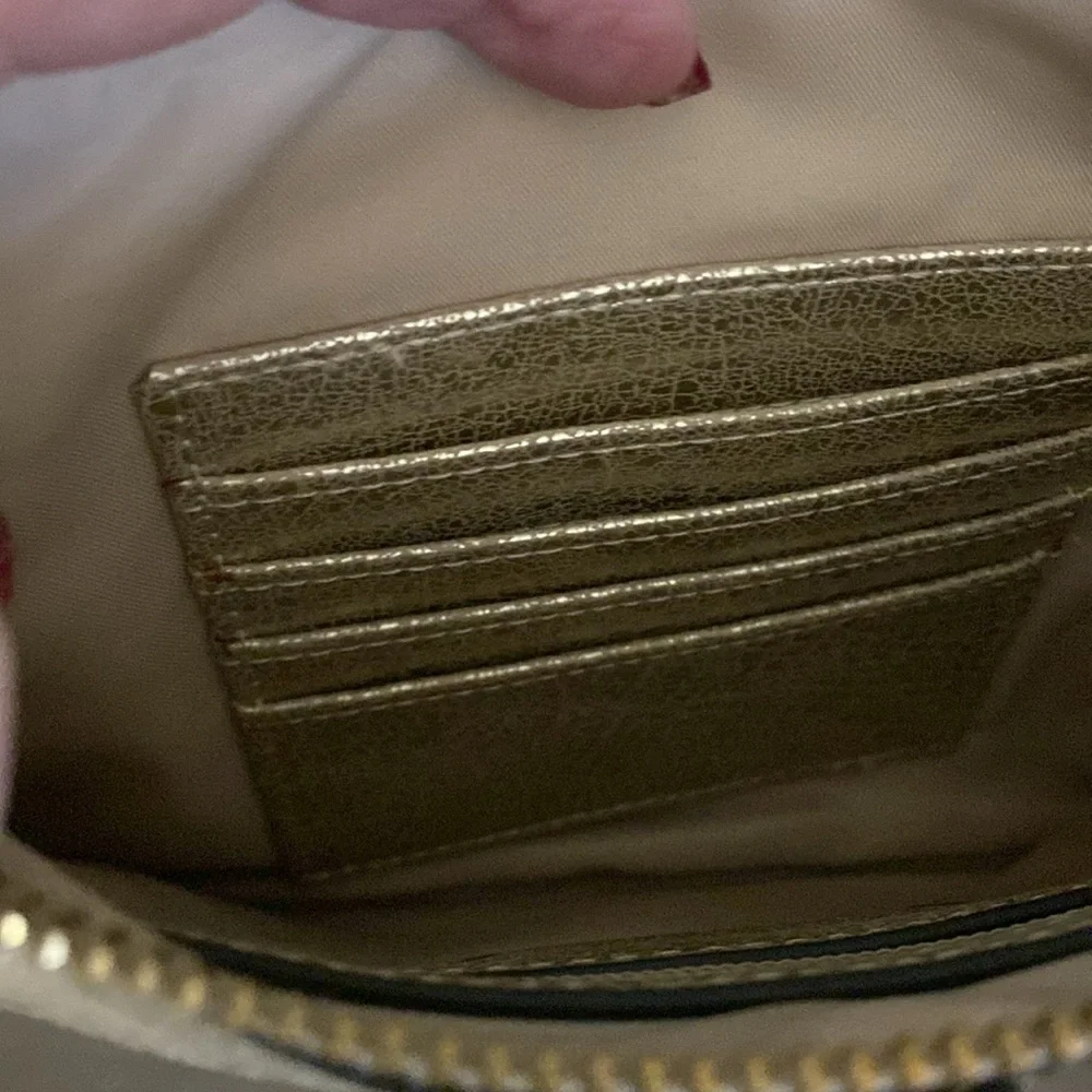 Gold wristlet clutch